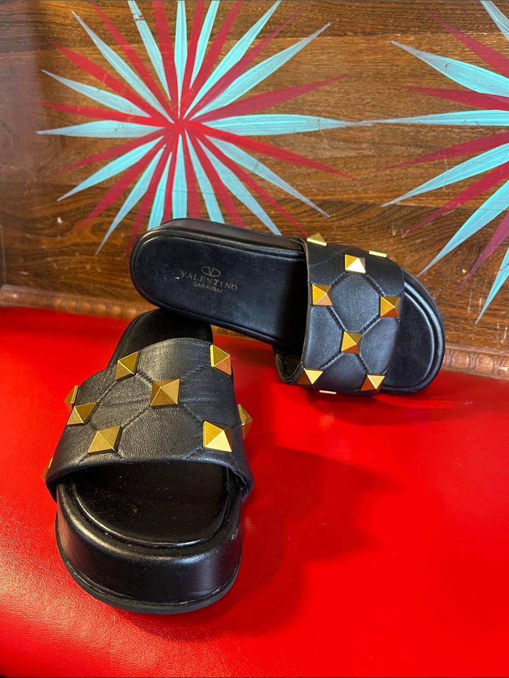 Valentino Black Leather Slide Mules with Gold Pyramid Studs